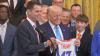 NCAA champions Florida Gators give Trump a ‘47' jersey during White House visit