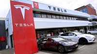 Electric vehicles outside a Tesla dealership in Melbourne on April 19, 2023.