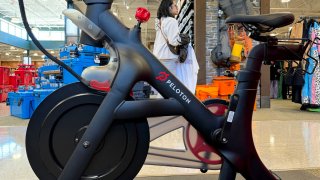 A Peloton bike is displayed at a Dick’s Sporting Goods store on May 08, 2024 in Daly City, California.