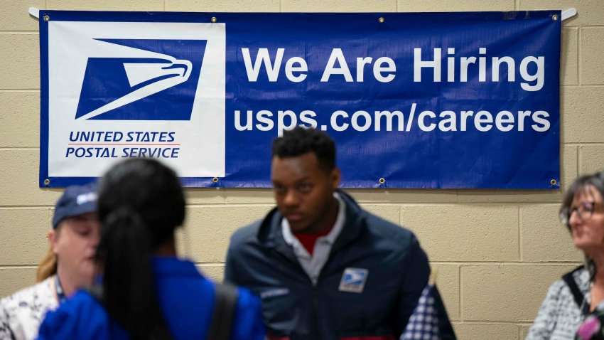 A United States Postal Service (USPS) booth at a job and resource fair hosted by the Asheville Area Chamber of Commerce in partnership with NCWorks in Fletcher, North Carolina, US, on Wednesday, April 9, 2025. 