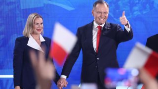 Marta Nawrocka and supported by Law and Justice party candidate for the President of Poland Karol Nawrocki during the election evening of the second round of the Presidential election in Warsaw, Poland on June 1, 2025.