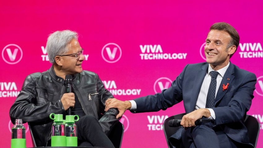Jensen Huang, co-founder and chief executive officer of Nvidia Corp., left, and Emmanuel Macron, France’s president at the 2025 VivaTech conference in Paris, France, on Wednesday, June 11, 2025.