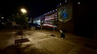 U.S. and Israeli flags projected on the historic walls of the Old City near Hebron Gate in Jerusalem, Israel, on June 22, 2025.