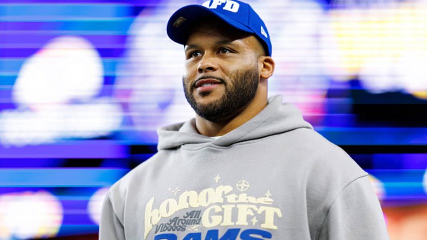 Former Los Angeles Rams defensive lineman Aaron Donald arrives to the stadium prior to an NFC Wild Card game against the Minnesota Vikings, at State Farm Stadium on January 13, 2025 in Glendale, Arizona.