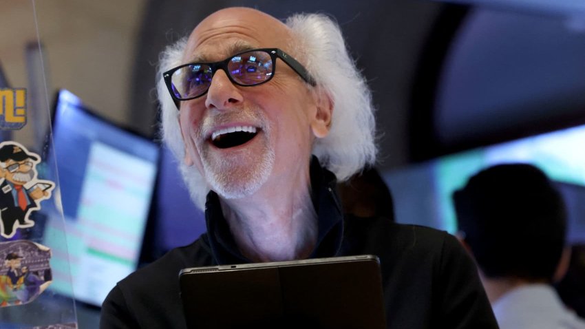 Traders work on the floor at the New York Stock Exchange (NYSE) in New York City, U.S., June 23, 2025.