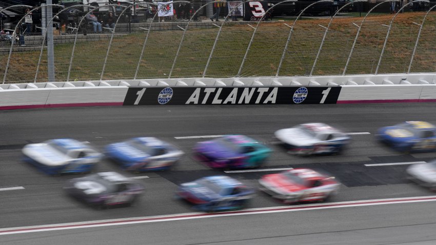 The field races through Turn 1