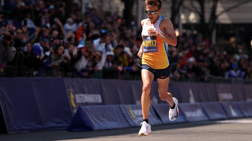 BOSTON, MASSACHUSETTS – APRIL 21: Conner Mantz of the United States crosses the finish line of the 129th Boston Marathon on April 21, 2025 in Boston, Massachusetts. (Photo by Maddie Meyer/Getty Images)