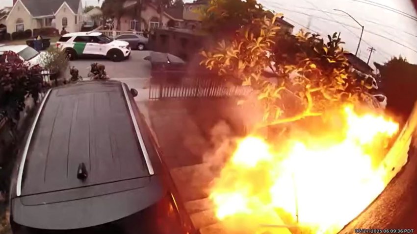 Video appears to show federal agents blast the front door from a Huntington Park home during a law enforcement operation Friday June 27, 2025 in the neighborhood.