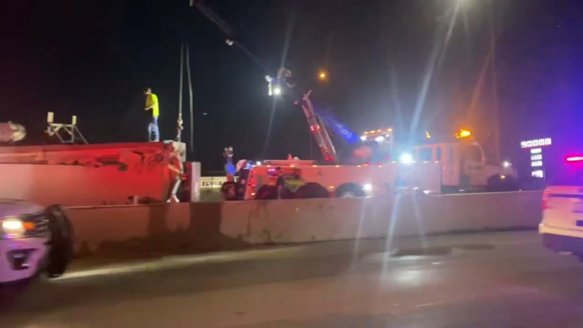 Kennedy lanes blocked after semi flips over onto inbound side; heavy traffic in both directions