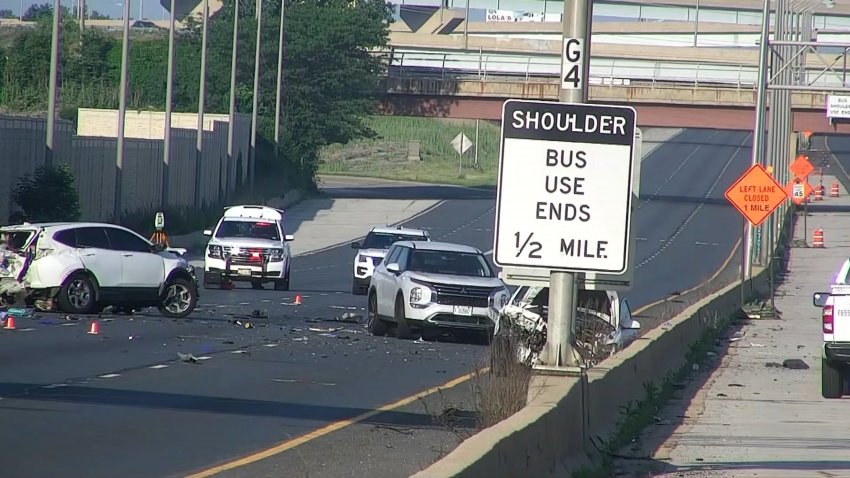 Multiple vehicles are shown on a highway near Lemont, Illinois. All three vehicles show heavy damage from a crash, which left two people dead.