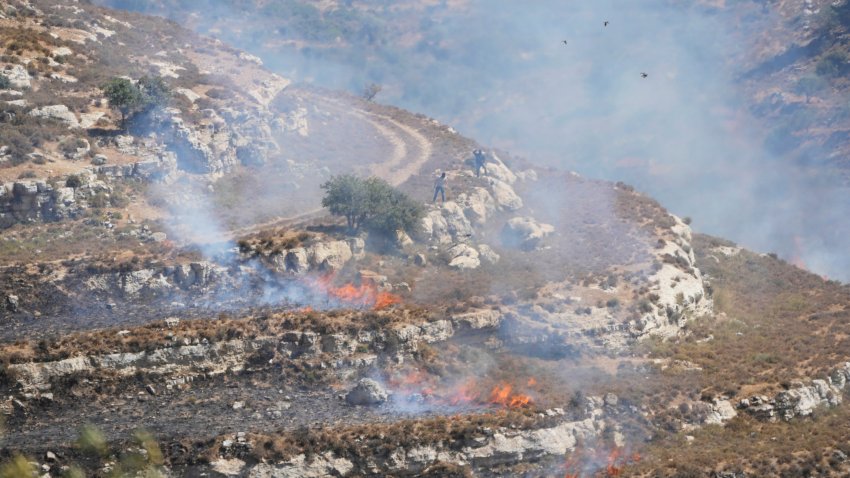 Israeli settlers clash with demonstrators during the protest of American-Palestinian landlords in the West Bank