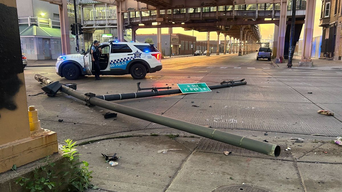 SUV crashes into CTA station; light poles, traffic lights strewn across the street