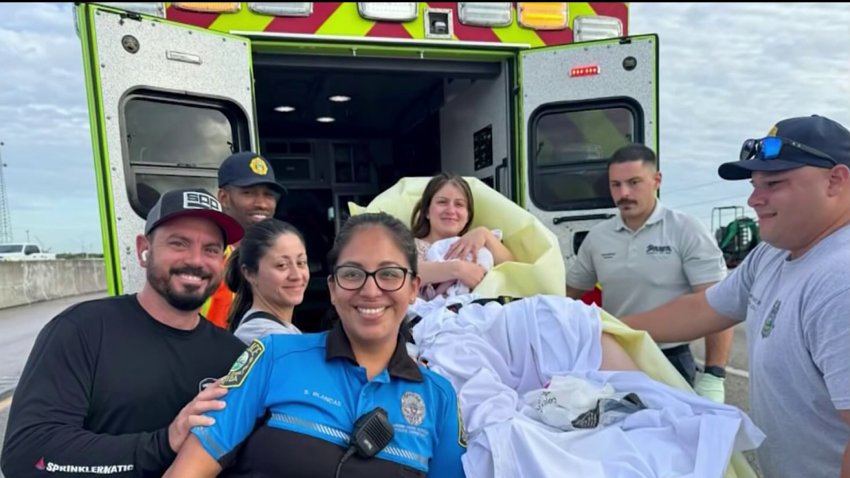 Two Miami-Dade school police officers helped a young woman deliver a baby on the side of the road after she went into labor while on Florida’s Turnpike.