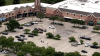 Major suburban shopping center reopens after vehicle fire
