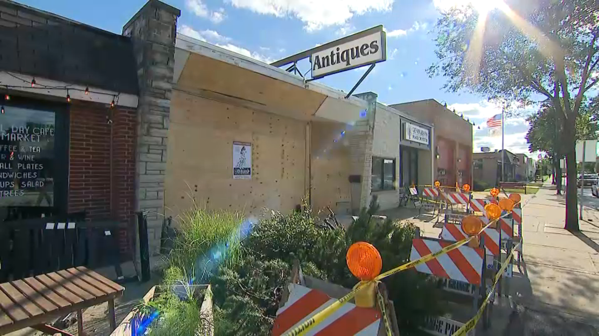 Garbage truck driver crashes into suburban antique store