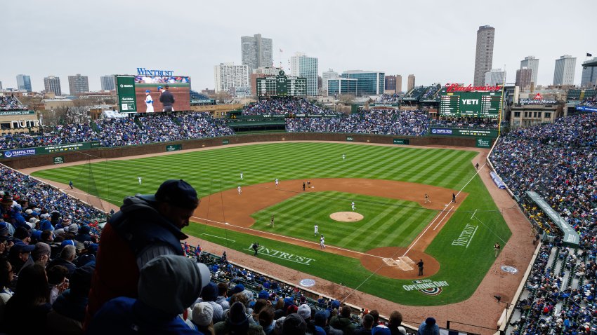 Fans watch the Chicago Cubs-San Diego Padres game during the home opener on April 4, 2025, at Wrigley Field in Chicago. (Armando L. Sanchez/Chicago Tribune/Tribune News Service via Getty Images)