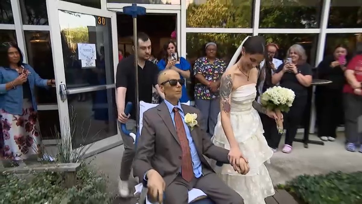 Impromptu wedding gives father with cancer chance to lead daughter down aisle