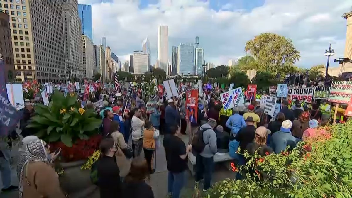 Protest against deployment of federal troops to Chicago takes over Michigan Avenue