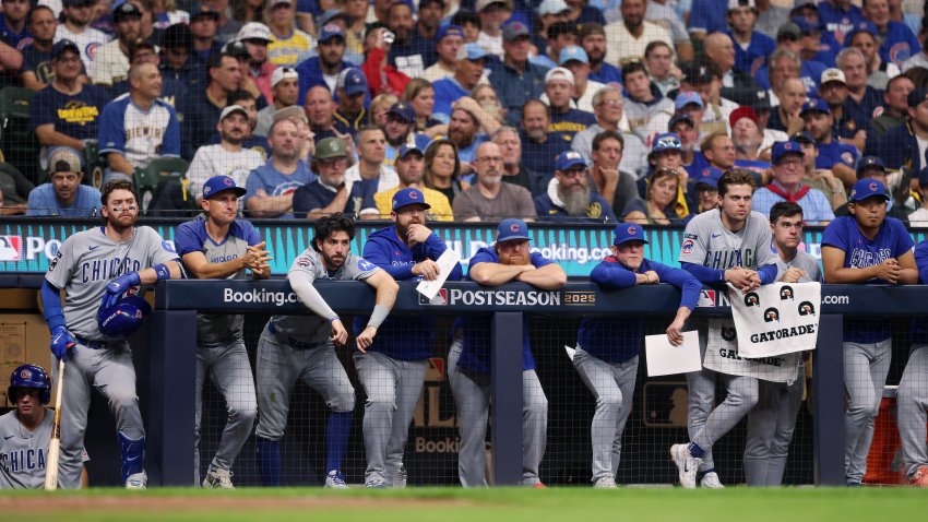 MILWAUKEE, WISCONSIN – OCTOBER 06: Members of the Chicago Cubs look on from the dugout during the eighth inning against the Milwaukee Brewers in game two of the National League Division Series at American Family Field on October 06, 2025 in Milwaukee, Wisconsin. (Photo by Michael Reaves/Getty Images)