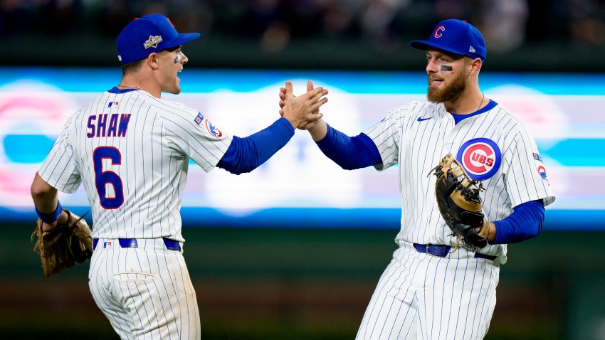 CHICAGO, ILLINOIS – OCTOBER 8: Michael Busch #29 of the Chicago Cubs celebrates the win with Matt Shaw #6 in Game Three of the National League Division Series against the Milwaukee Brewers at Wrigley Field on October 8, 2025 in Chicago, Illinois. (Photo by Matt Dirksen/Chicago Cubs/Getty Images)