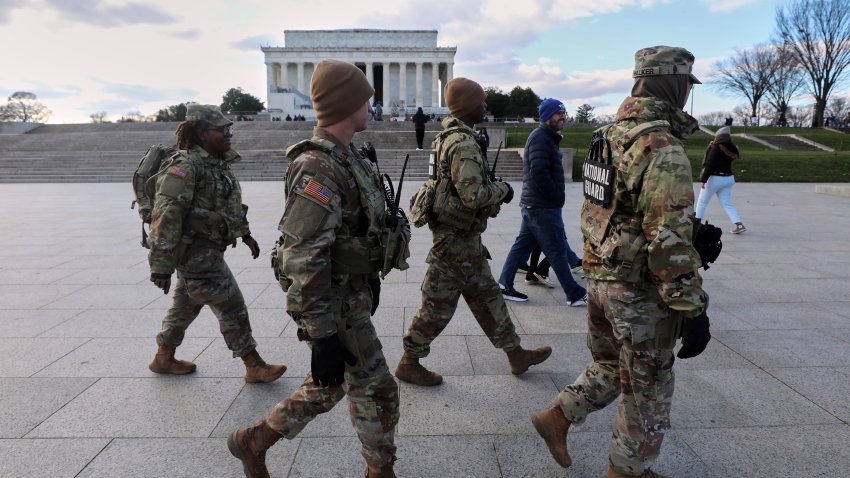 National Guard patrol the National Mall near the Lincoln Memorial