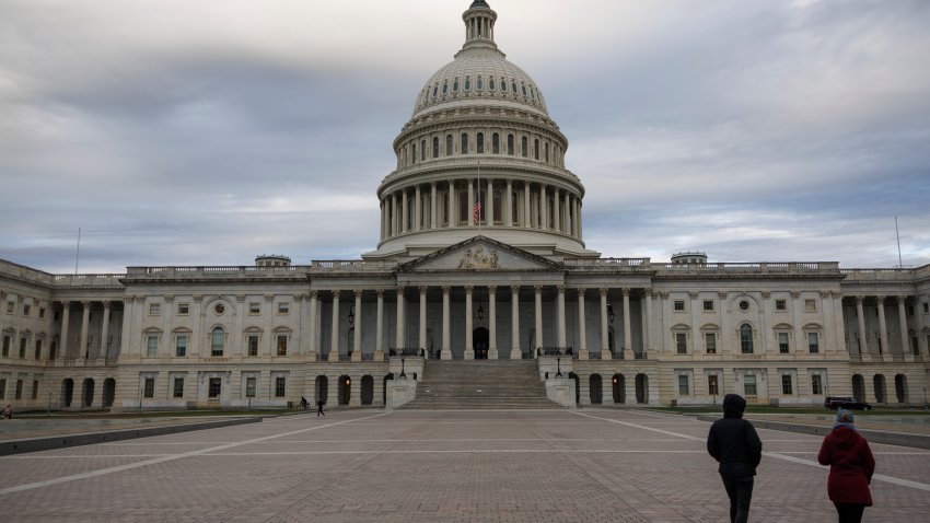WASHINGTON, DC – NOVEMBER 10: Pedestrians walk across the East Front Plaza on November 10, 2025 on Capitol Hill in Washington, DC. The Senate reached a deal late Sunday to fund the Government, aiming to end the longest shutdown in history. (Photo by Tom Brenner/Getty Images)