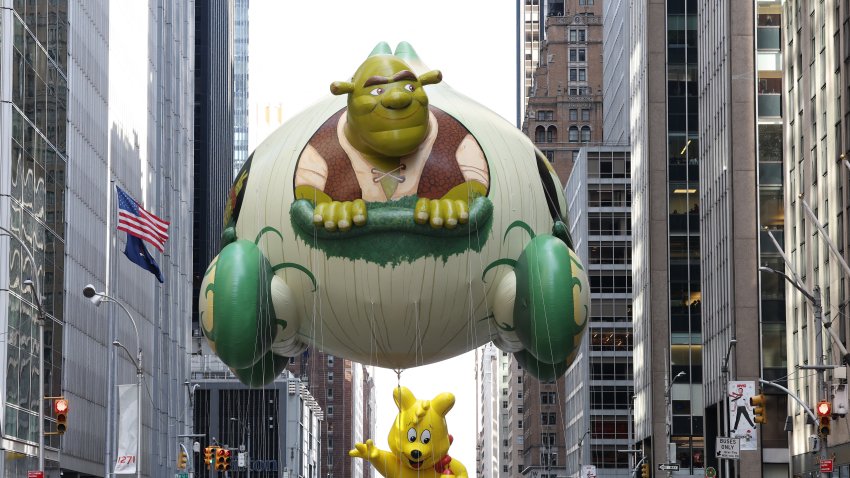 Shrek’s Onion Carriage balloon floats down the street during the annual Macy’s Thanksgiving Day Parade in New York City on November 27, 2025.