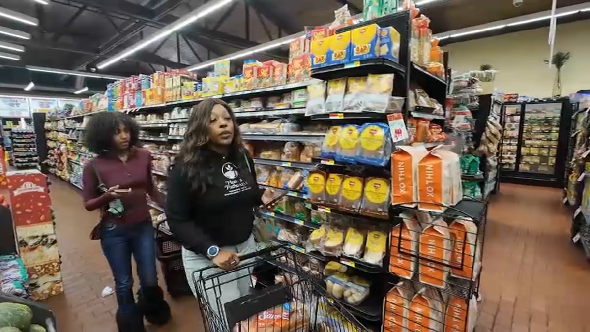 Local woman shifts non-profit to serve as a ‘grocery buddy' amid SNAP delays