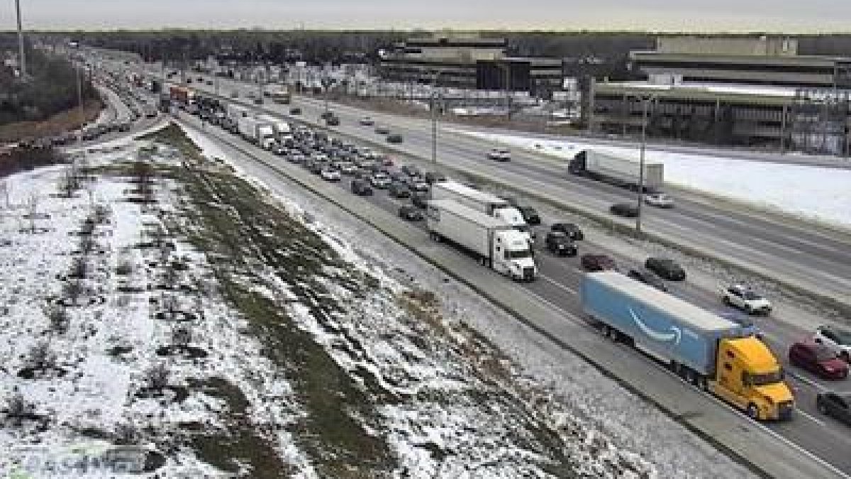 Traffic snarled on westbound I-94 Saturday after a vehicle flipped during a crash, prompting the closure of three lanes, state police said.