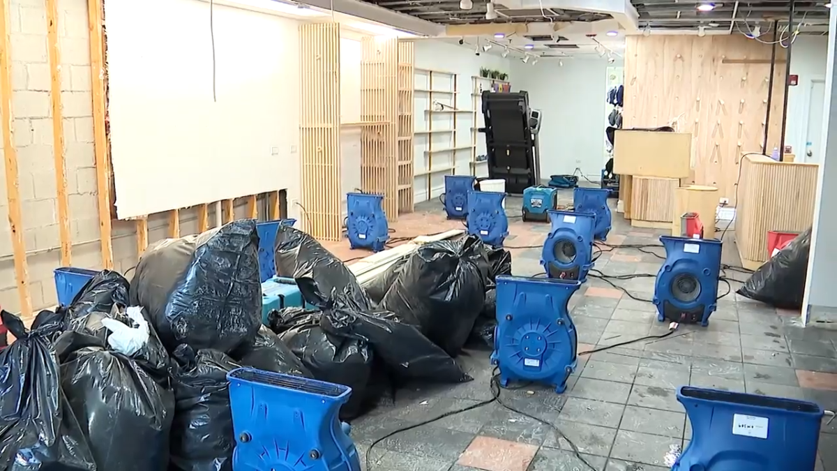 Suburban running shop moves toward reopening after pipe bursts in bitter cold Suburban running shop moves toward reopening after pipe bursts in bitter cold