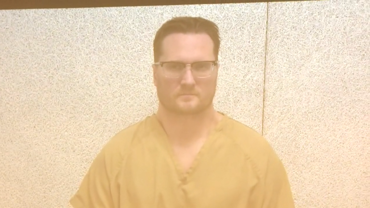 Chicago surgeon pleads not guilty to the killings of his ex-wife and her dentist husband in Ohio