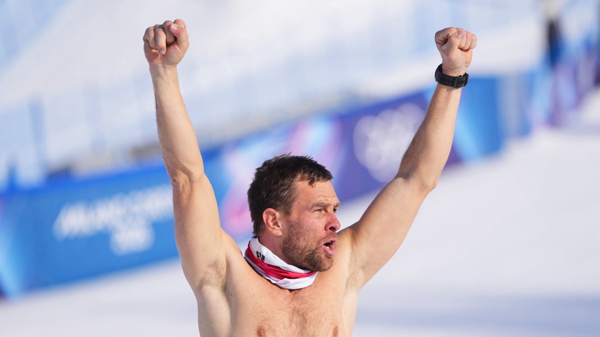 WATCH: 40-year-old snowboarder rips off shirt to celebrate gold medal