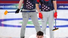 Great Britain's Grant Hardie (front) reacts as USA's Ben Richardson (left) and Aidan Oldenburg look on