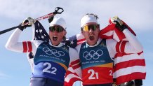 Ben Ogden of Team United States and Gus Schumacher of Team United States celebrate after winning the Silver medal in the Men's Team Sprint Free Finals on day twelve of the Milano Cortina 2026 Winter Olympic games at Tesero Cross-Country Skiing Stadium on February 18, 2026 in Val di Fiemme, Italy. 