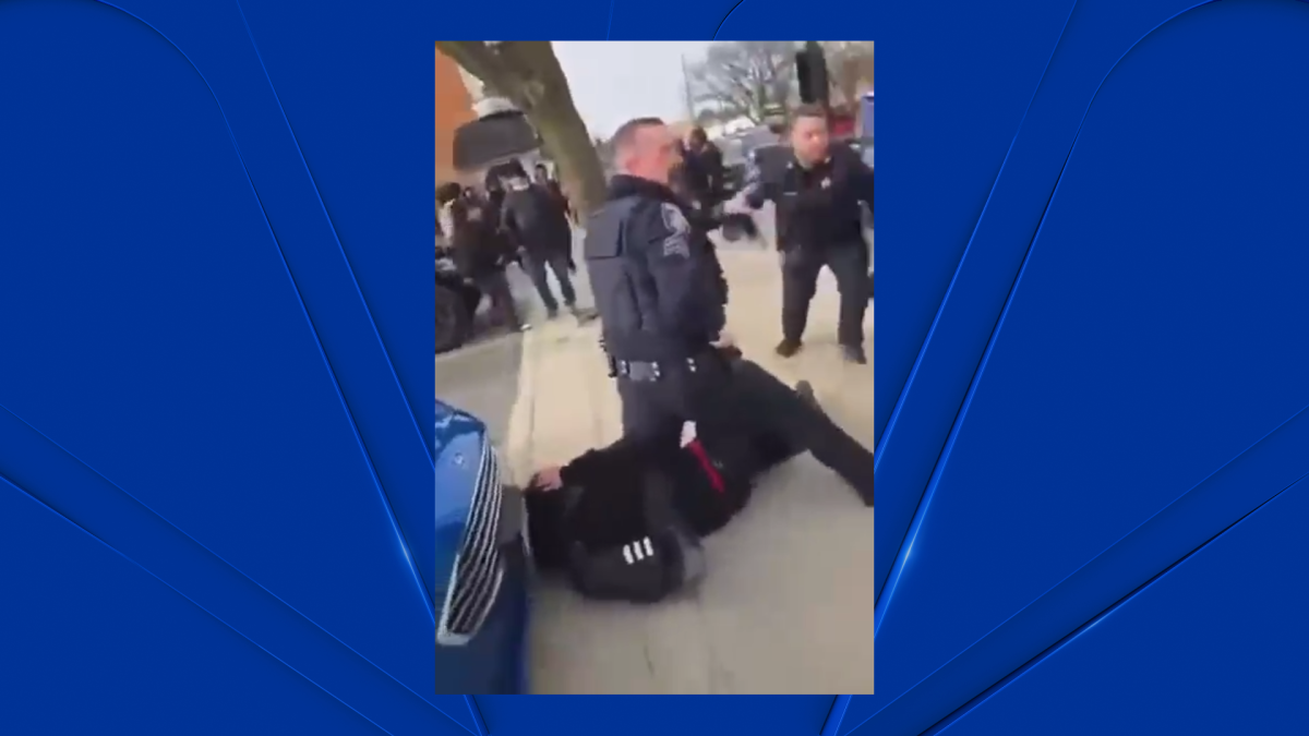 Video shows Aurora police officer kneeling on person amid student protest against ICE Video shows Aurora police officer kneeling on person amid student protest against ICE