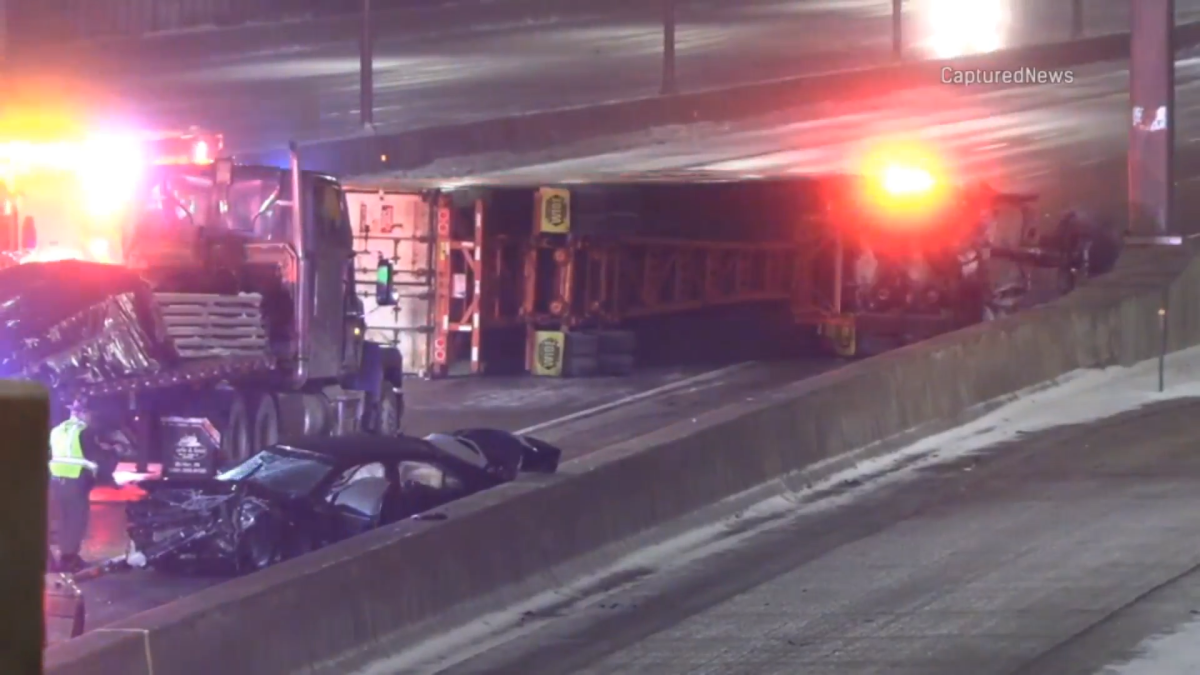 I-90 westbound lanes in northwest suburbs shut down after semi pushes car in to EMS worker