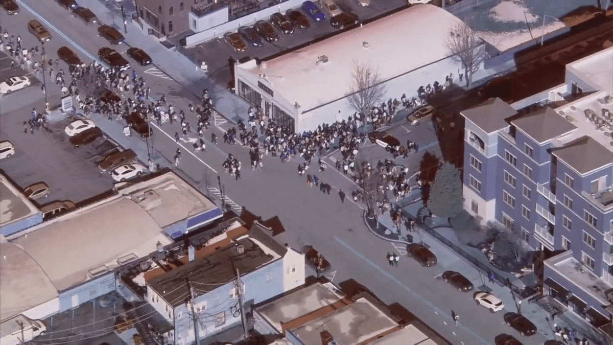 Thousands of students from several suburban schools walk out of class to protest ICE