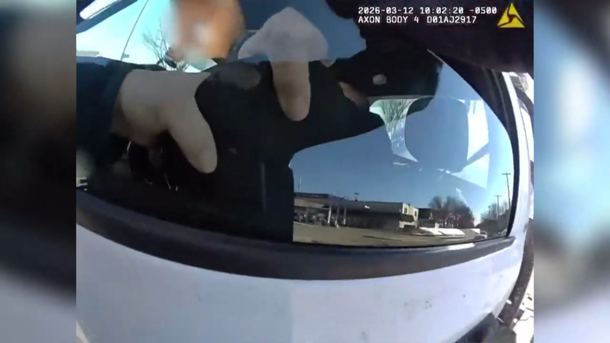 Dramatic video shows Milwaukee officer clinging to tow truck before fatal shooting