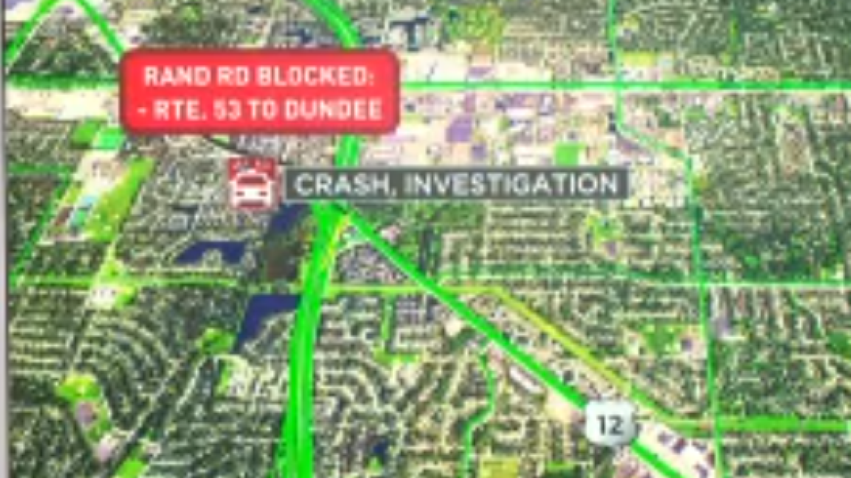 Roads closed in NW suburbs after man found shot, killed in crashed car