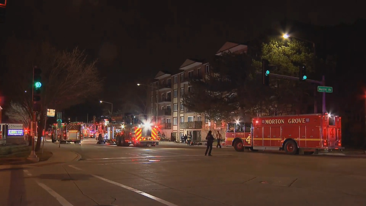 Suburban firefighters rescue residents after partial floor collapse in condo
