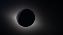 The Moon fully eclipsing the Sun.