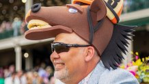 An attendee wears a funny hat during the 152nd running of the Kentucky Derby at Churchill Downs in Louisville, Kentucky, on May 2, 2026. (Photo by Leandro Lozada / AFP via Getty Images)