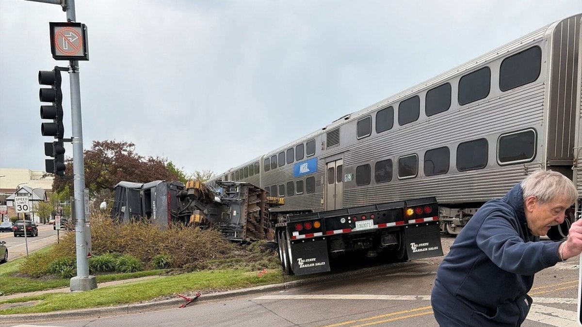 Metra UP-N trains halted after crash with flatbed carrying milling equipment