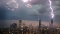 CHICAGO, IL – JUNE 12:  Lightning strikes the Willis Tower (formerly Sears Tower) in downtown on June 12, 2013 in Chicago, Illinois. A massive storm system with heavy rain, high winds, hail and possible tornadoes is expected to move into Illinois and much of the central part of the Midwest today.  (Photo by Scott Olson/Getty Images)