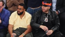 DJ Khaled and Fat Joe attend a game.