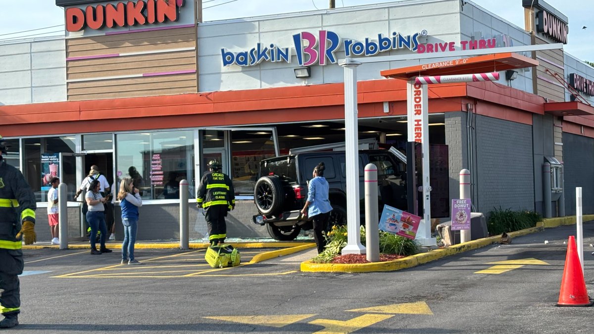 Vehicle drives into Dunkin near prominent suburban shopping center