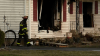 Mother charged after 4-year-old son left alone dies in suburban house fire