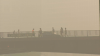 Wildfire smoke to linger through start of week before potentially severe storms