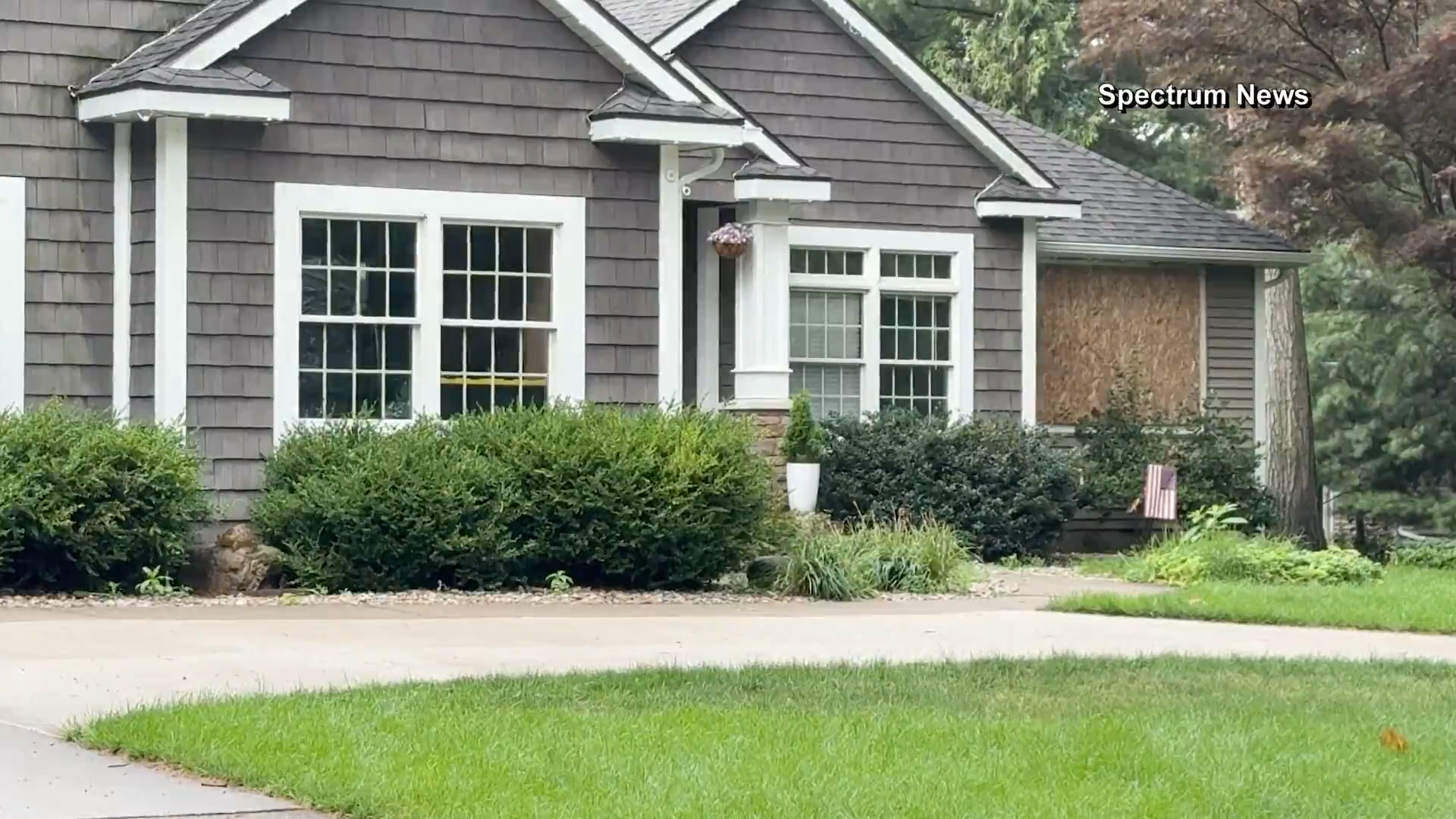 Officials say man killed wife and 6 kids, then himself, before all were found in Michigan home fire