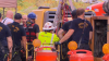 Rescuers search for trapped contractors in Downers Grove storm drain amid intense storms